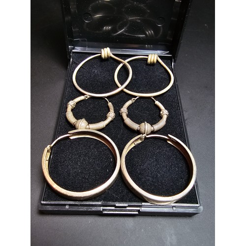 281 - A bundle of 3 pairs of 925 silver hoop earrings, all in good order complete with presentation box. T... 