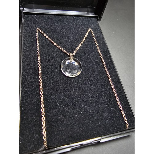 285 - A pretty 925 silver necklace with a faceted crystal glass pendant with a 16