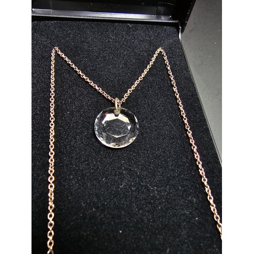 285 - A pretty 925 silver necklace with a faceted crystal glass pendant with a 16