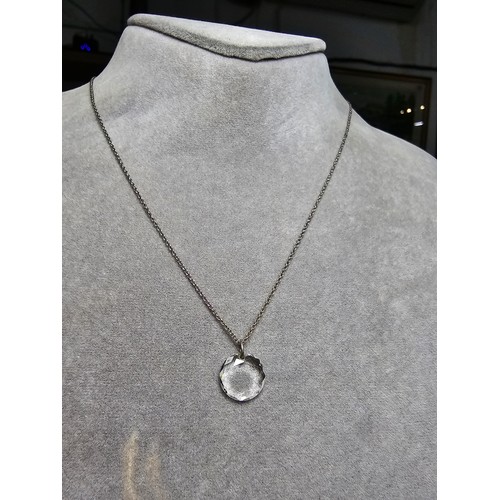 285 - A pretty 925 silver necklace with a faceted crystal glass pendant with a 16