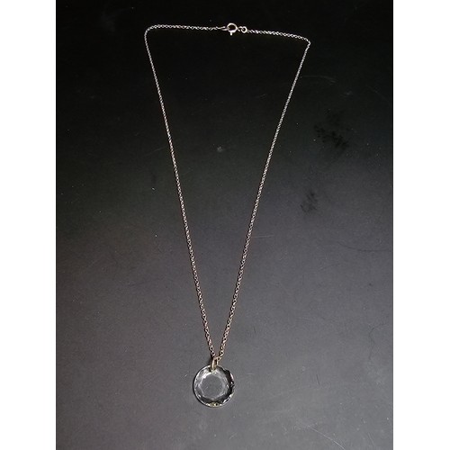 285 - A pretty 925 silver necklace with a faceted crystal glass pendant with a 16