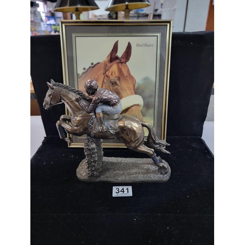 436 - Framed and glazed photo of Red Rum 1970's Grand National Winner along with a resin brass effect hors... 