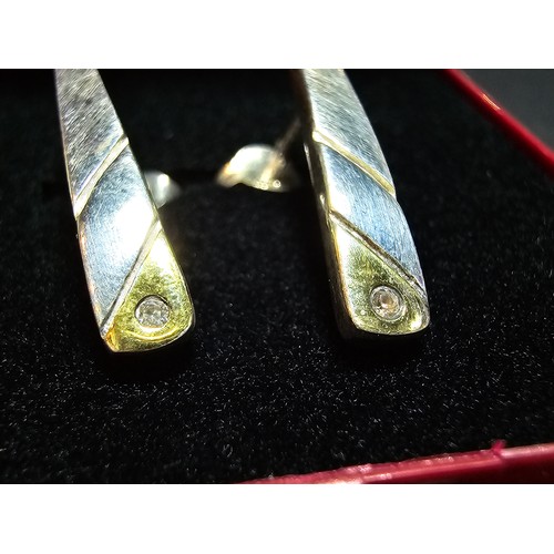 288 - A pair pf pretty 925 silver drop stud earrings with gold layered base to each earring is inset with ... 