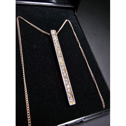 298 - A 925 silver bar pendant channel set with sparkly crystal cz stones on a 16