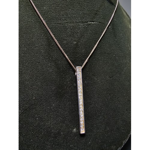 298 - A 925 silver bar pendant channel set with sparkly crystal cz stones on a 16