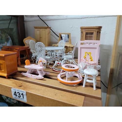 431 - A large comprehensive quantity of dolls house furniture including various room sets which includes p... 