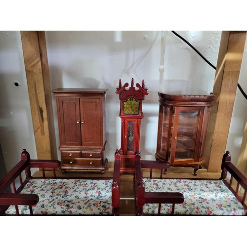 431 - A large comprehensive quantity of dolls house furniture including various room sets which includes p... 