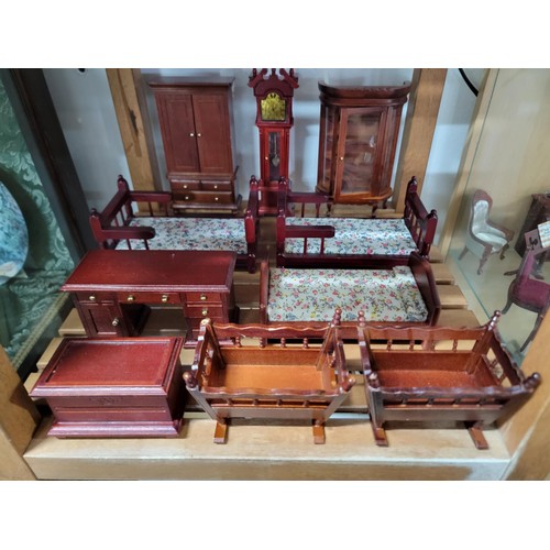 431 - A large comprehensive quantity of dolls house furniture including various room sets which includes p... 