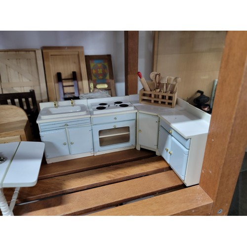 431 - A large comprehensive quantity of dolls house furniture including various room sets which includes p... 