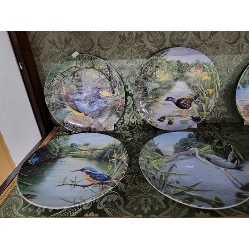 432 - one box and one bag of 12 danbury mint limited edition plates wedgwood plate with COA and a calender... 