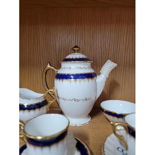 435 - Good Coalport six setting coffee set in blue and gold in fine condition