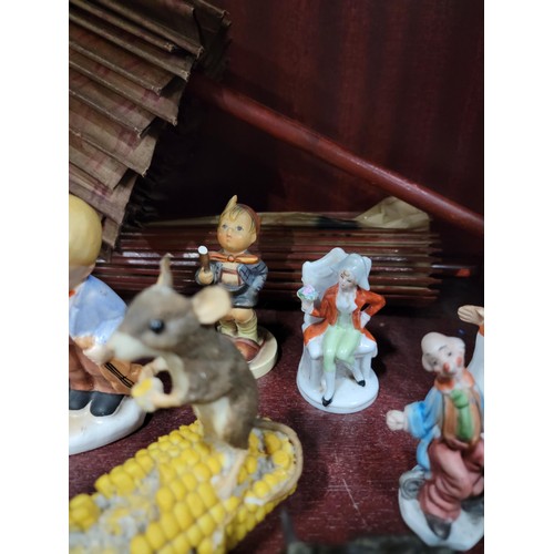 442 - Vast qty ceramic figurines along with two Chinese parasols