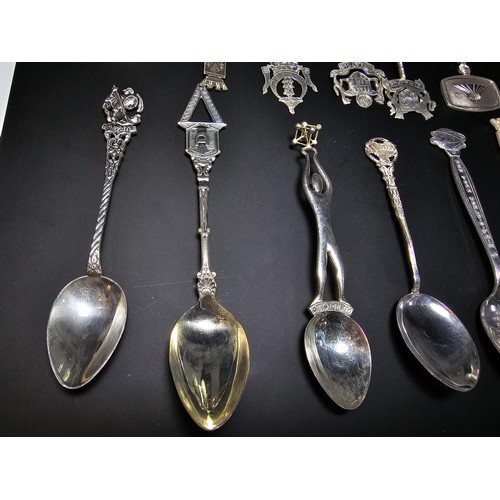 300 - A lot of collectables which includes 9x solid silver tea spoons, a pair of salt and pepper shakers m... 