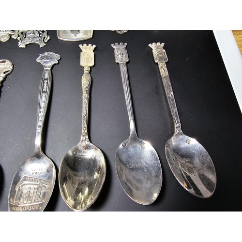 300 - A lot of collectables which includes 9x solid silver tea spoons, a pair of salt and pepper shakers m... 