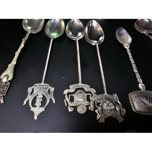 300 - A lot of collectables which includes 9x solid silver tea spoons, a pair of salt and pepper shakers m... 