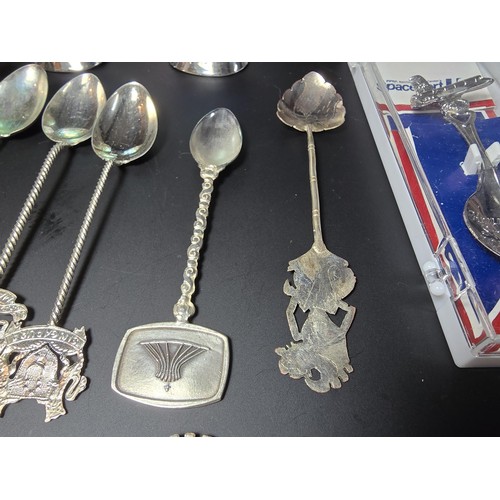 300 - A lot of collectables which includes 9x solid silver tea spoons, a pair of salt and pepper shakers m... 