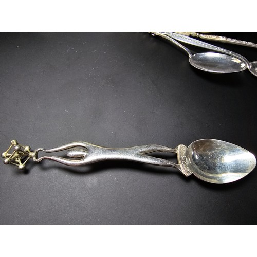 300 - A lot of collectables which includes 9x solid silver tea spoons, a pair of salt and pepper shakers m... 