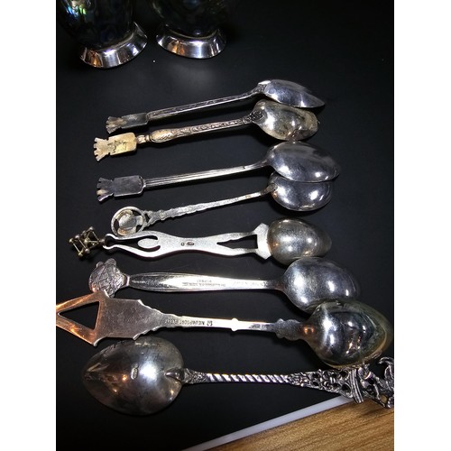 300 - A lot of collectables which includes 9x solid silver tea spoons, a pair of salt and pepper shakers m... 