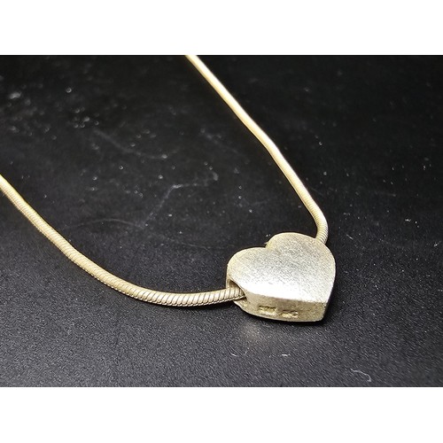 302 - A pretty 925 silver necklace with a heart pendant. Necklace is 16