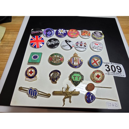 309 - A suite of approx 23x pin badges and button badges which includes some button badges relating to fam... 