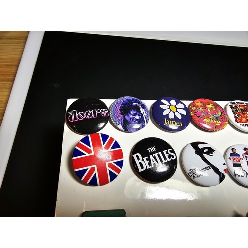 309 - A suite of approx 23x pin badges and button badges which includes some button badges relating to fam... 