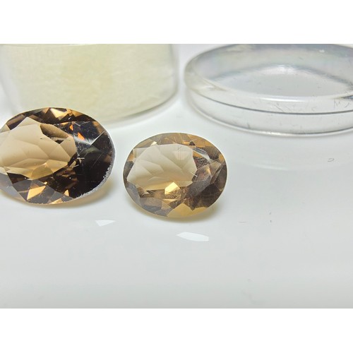 316 - 2x impressive natural smokey quartz, loose faceted gemstones presenting an excellent natural colour.... 