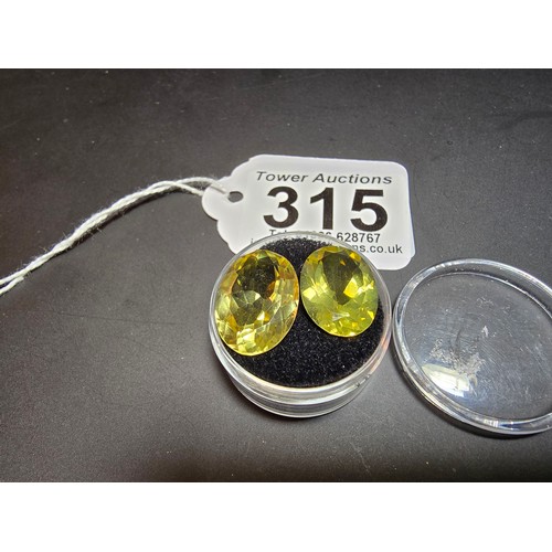 315 - 2x impressive good quality large faceted natural citrine loose gemstones. Length of the larger piece... 