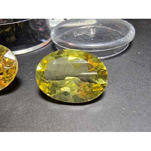 315 - 2x impressive good quality large faceted natural citrine loose gemstones. Length of the larger piece... 