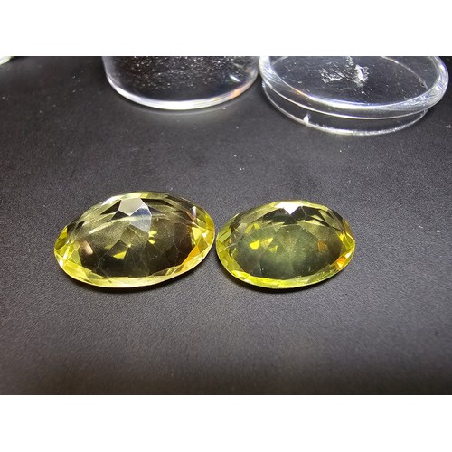 315 - 2x impressive good quality large faceted natural citrine loose gemstones. Length of the larger piece... 