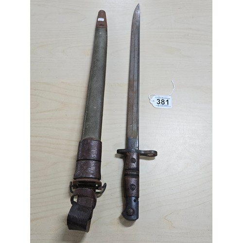 381 - Good WWI US military Remington bayonet and scabbard, the bayonet is marked Remington and dated 1916 ... 