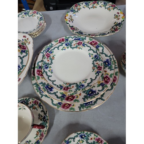 449 - A Royal Cauldon Victoria series large dinner set. 58 items all in good order, inc graduated serving ... 