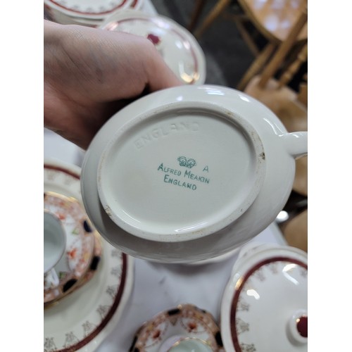 451 - Coldough china tea set, 40 piece in total. with an Alfred Meakin part dinner set