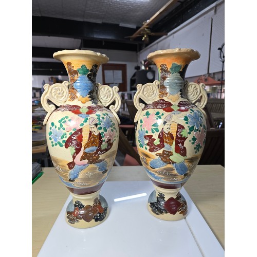 387 - Pair of good quality antique Japanese satsuma vases featuring an ornate hand painted scene to each v... 