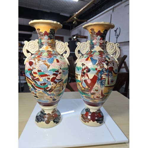 387 - Pair of good quality antique Japanese satsuma vases featuring an ornate hand painted scene to each v... 