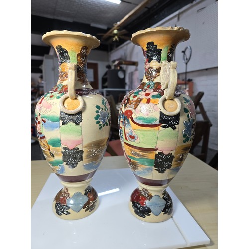 387 - Pair of good quality antique Japanese satsuma vases featuring an ornate hand painted scene to each v... 