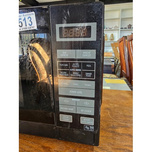 513 - Sharp 800w microwave in good condition and in full working order