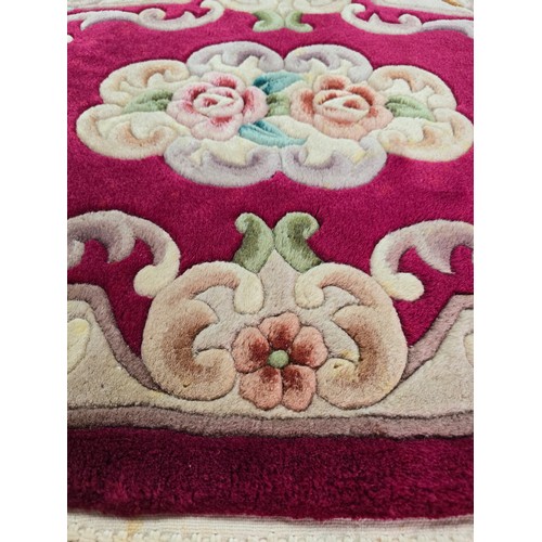 524 - Oriental hand knotted thick pile rug along with a red runner rug and a red leather kneeler, the orie... 