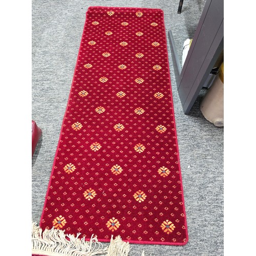 524 - Oriental hand knotted thick pile rug along with a red runner rug and a red leather kneeler, the orie... 