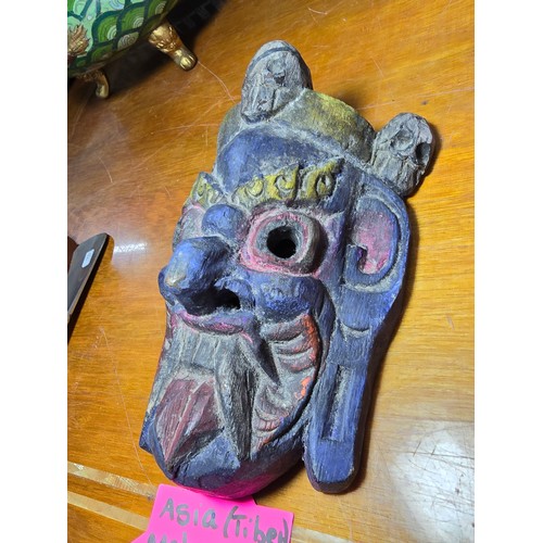 375 - A good vintage Tibetan Mahakala protective spirit mask crowned with 3 citipati heads. In good condit... 