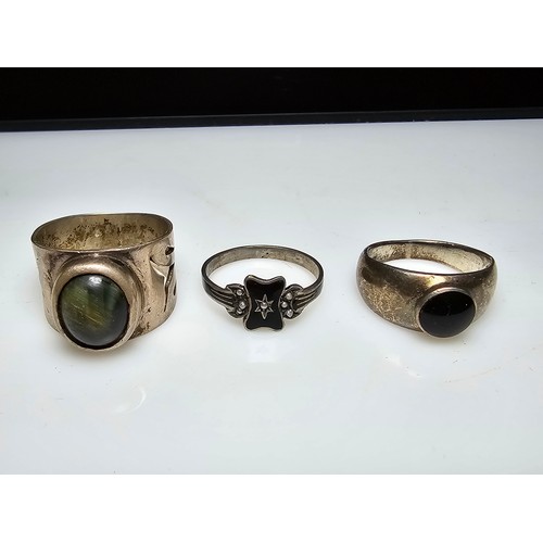 258 - A bundle of 3x 925 silver rings which includes a chunky silver ring inset with a tigers eye stone, a... 