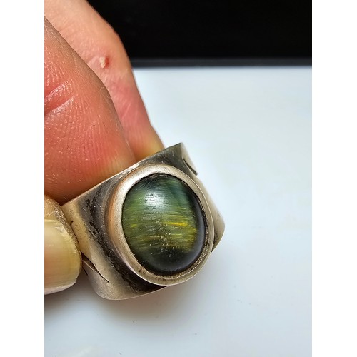 258 - A bundle of 3x 925 silver rings which includes a chunky silver ring inset with a tigers eye stone, a... 