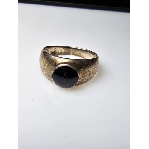 258 - A bundle of 3x 925 silver rings which includes a chunky silver ring inset with a tigers eye stone, a... 