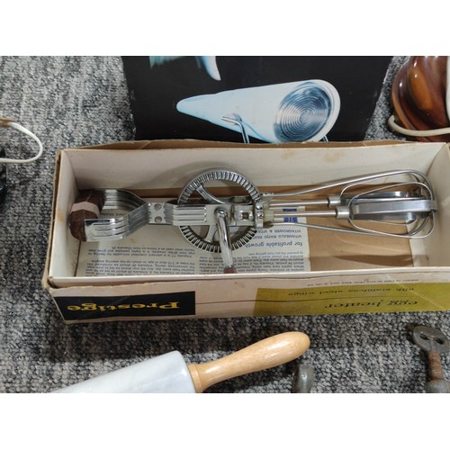 416A - 2 lamps and a Philips Infraphil, a prestige egg beater in box, a marble rolling pin on a wooden stan... 