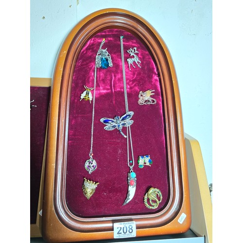 208 - Good quality display board (included) displaying a quantity of costume jewellery inc small bee forme... 