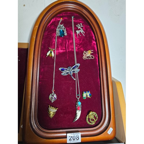 208 - Good quality display board (included) displaying a quantity of costume jewellery inc small bee forme... 