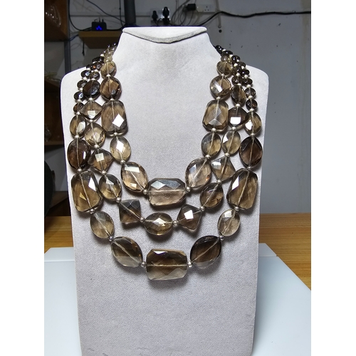 207 - Stunning triple strand faceted Smokey Quartz large beaded necklace with 925 silver clasp. Displays v... 