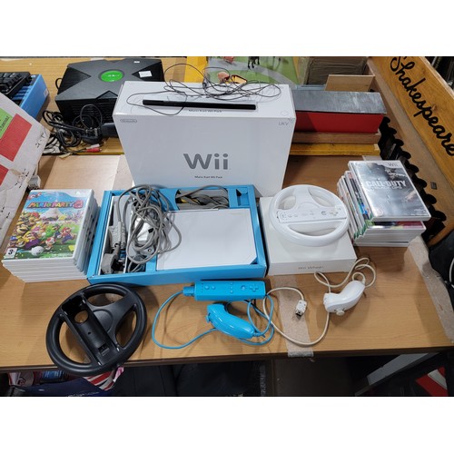 5 - Complete boxed Wii console 12x games to include Mario party 8, Call of duty, along with steering whe... 