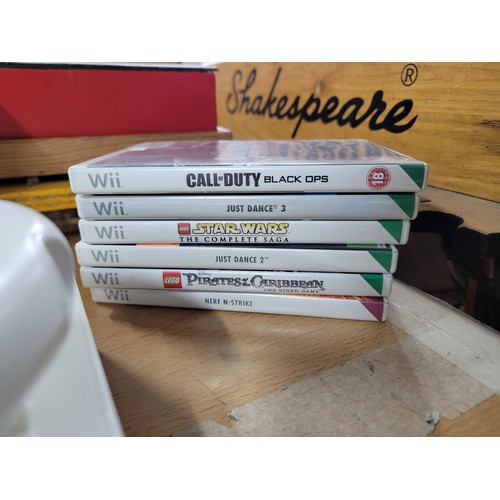 5 - Complete boxed Wii console 12x games to include Mario party 8, Call of duty, along with steering whe... 