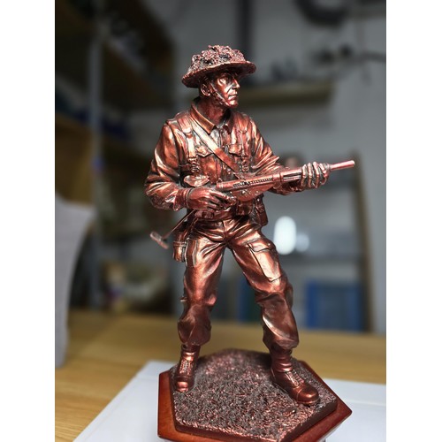 152 - An impressive Danbury mint The Liberator WWII bronzed resin solider figure with a set of 5 British c... 