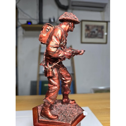 152 - An impressive Danbury mint The Liberator WWII bronzed resin solider figure with a set of 5 British c... 